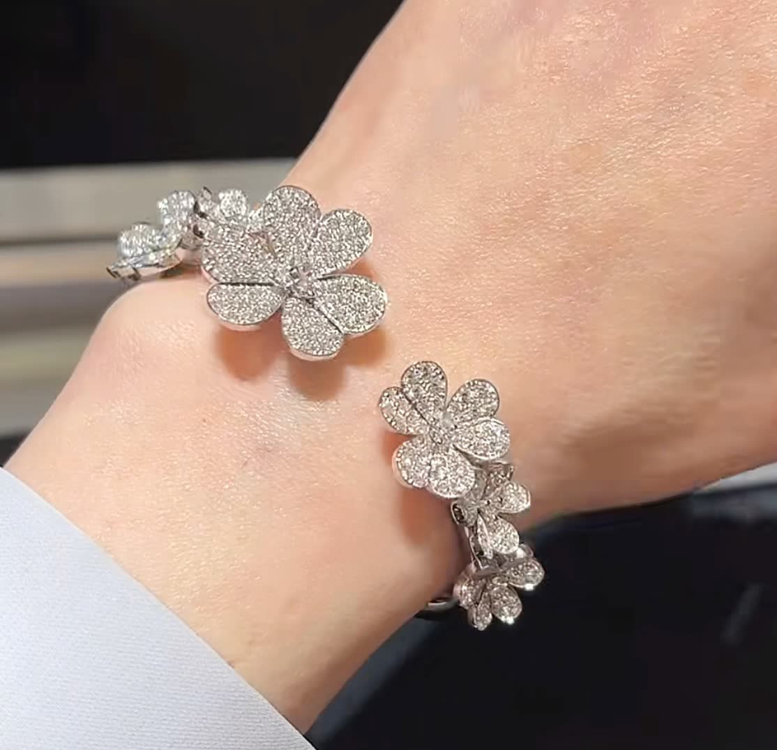 Van Cleef & Arpels Silver Flower Bracelet with Diamonds Van Cleef & Arpels Silver Flower Bracelet with Diamonds